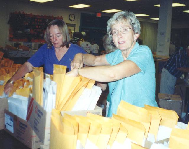 Stuffing the Envelopes.
Sally Gregson and Sandra (Gregson) Thompson  :: Click image to download full-sized image