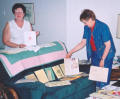 Pat (Johnson) Linge and Rae (Parkes) Long working on memorabilia :: Click photo for larger view